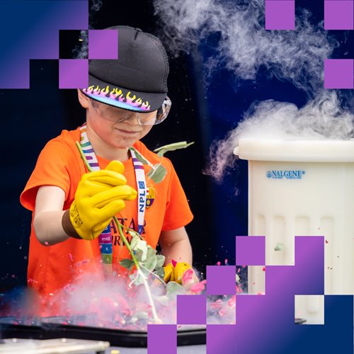 Child from audience carrying out liquid nitrogen show